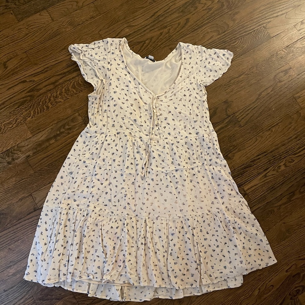 White dress with blue flowers
